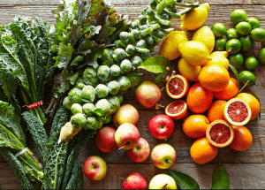 a group of fruits and vegetables on a wood surface Healthy Weight Loss Diets Broxburn